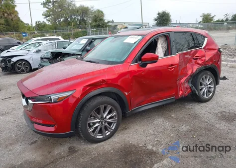 2021 Mazda Cx-5 Grand Touring Reserve z USA, uszkodzony, nr VIN JM3KFBAY8M0400991